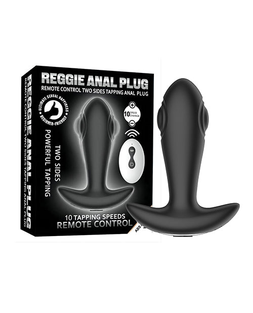 Reggie Tapping Anal Plug